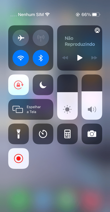 Captura de tela de um smartphone iOS mostrando o símbolo de gravação de tela